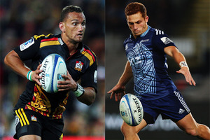 Aaron Cruden of the Chiefs and Ihaia West of the Blues rugby team. Photos / Getty Images