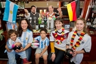 HAPPY FOOTBALL FAMILIES: The road to the World Cup final, in Napier, is led by Santiago De Marco and Philipp Otto (rear) and Lucia De Marco (front left), 3, Sandra De Marco, Mateo De Marco, 6, Emily Otto, and Brianna Otto, 15. They were at the Provincial Hotel yesterday where fans of Argentina and Germany are expected to gather for the World Cup final, starting at 7am on Monday. PHOTO/GLENN TAYLOR HBT14301201 HAPPY FOOTBALL FAMILIES: The road to the World Cup final, in Napier, is led by Santiago De Marco and Philipp Otto (rear) and Lucia De Marco (front left), 3, Sandra De Marco, Mateo De Marco, 6, Emily Otto, and Brianna Otto, 15. They were at the Provincial Hotel yesterday where fans of Argentina and Germany are expected to gather for the World Cup final, starting at 7am on Monday. PHOTO/GLENN TAYLOR HBT14301201