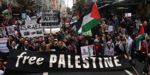Protesters block Queen Street. Photo / Michael Craig