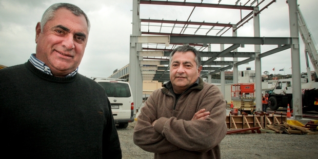 The D'Esposito brothers Nino (left) and Joe in front of their new development that will see their workforce increase to nearly 200 staff. Photo/Warren Buckland