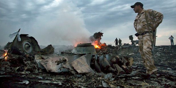 Debris at the crash site near the village of Grabovo, Ukraine. Photo / AP