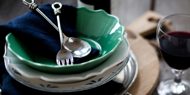 Bowls, plates, chopping board, linen, pewter tray and wine glasses all from French Country Collections. Photo / Babiche Martens.