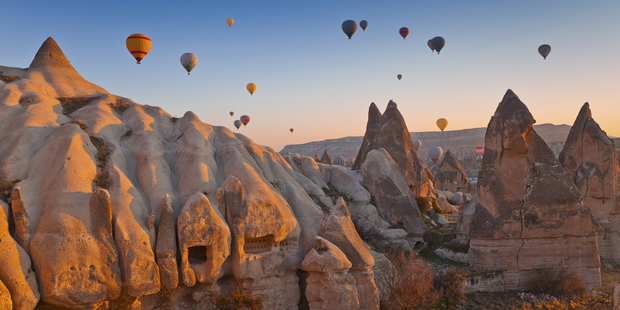 Marvel at Cappadocia's lunar-like landscape from above in a hot air balloon and visit its ancient underground cities. Photo / Thinkstock