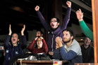 Germany fan Bob Beynis leaps for joy as his team scores a goal against Argentina as friends (from left to right) Justina Allauche, Agatha Latissier and Jememy Pinto watch on. Photo/George Novak Germany fan Bob Beynis leaps for joy as his team scores a goal against Argentina as friends (from left to right) Justina Allauche, Agatha Latissier and Jememy Pinto watch on. Photo/George Novak