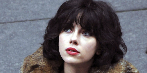 Johansson is in disguise, with a British accent and raven hair in Under the Skin.