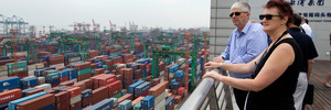 Geoff and Mary-Anne Lindsay, dairy farmers of Otautau, Southland, viewing the Shanghai Pudong Container terminal, Shanghai. Photo / Mark Mitchell