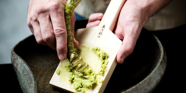 Fresh wasabi root grated on a shark fin paddle at Masu. Photo / Babiche Martens