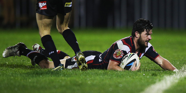 Chad Townsend of the Warriors dives over to score a try during the round 18 NRL match against the Parramatta Eels. Photo / Getty Images
