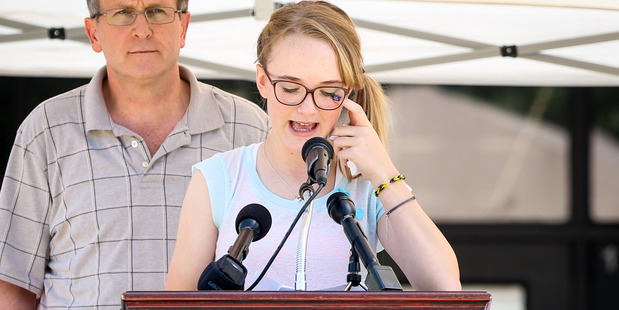Cassidy Stay speaks during a memorial service for the Stay family at Lemm Elementary School on Saturday. Photo / AP