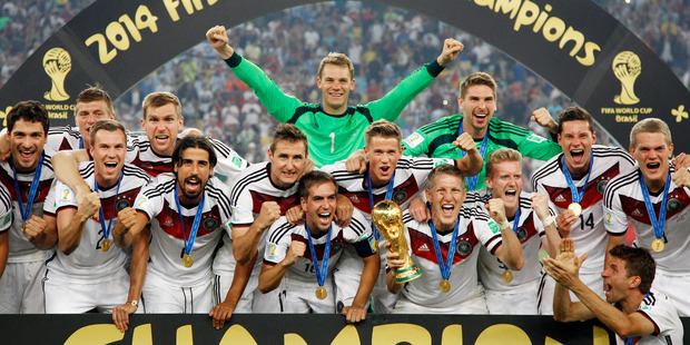 German players celebrate with the trophy after the World Cup final soccer match between Germany and Argentina. Photo / AP
