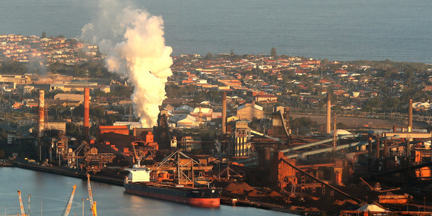 Steel works factories in Port Kembla, south of Sydney. The Australian government has won final approval from Parliament to scrap levies for carbon dioxide emissions. Photo / AP