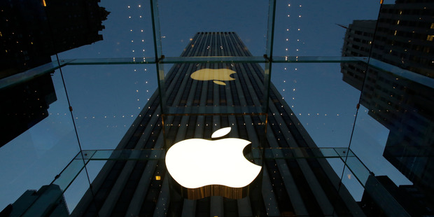 Apple is teaming up with former nemesis IBM in an attempt to sell more iPhones and iPads to corporate customers and government agencies. Photo / AP