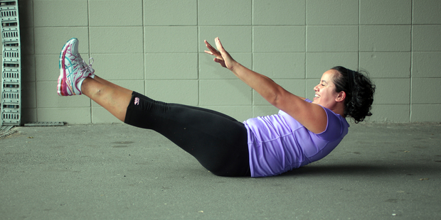 Leah Ropati demonstrates a V sit up. Photo / Doug Sherring