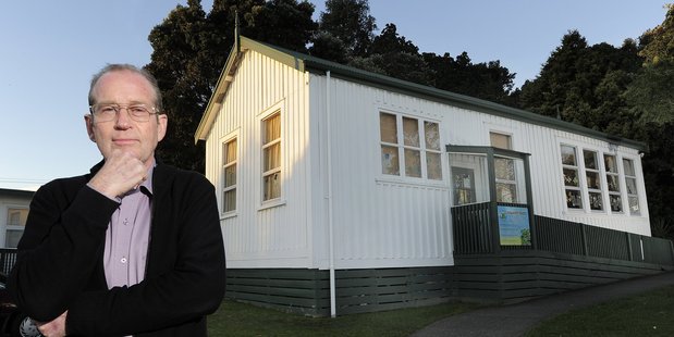 School principal Geoff Opie in front of the 116-year-old classroom.