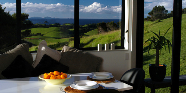 The Ara Roa guest house overlooks hills, ocean, estuary and islands.