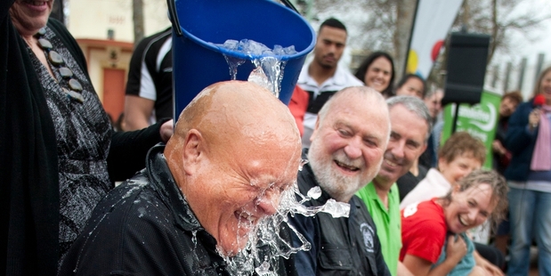 Flaxmere councillor Henare O'Keefe receives an icy dunking in the Hastings CBD while Hawke's Bay regional councillor Rex Graham, Hastings Mayor Lawrence Yule and Tukituki Labour candidate Anna Lorck look on. Photo/Warren Buckland