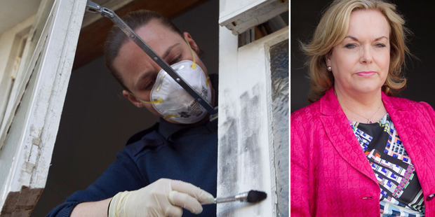A crime scene attendant looks for fingerprints after a burglary. Right, Judith Collins trumpeted a fall in recorded burglaries in her electorate. Photo / NZ Herald