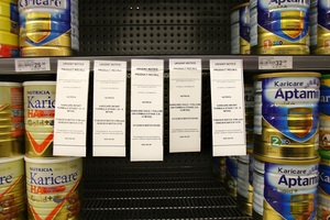 Danone's Nutricia subsidiary recalled 67,000 cans of its Karicare baby formula, leaving empty spaces on supermarket shelves. Photo / APN