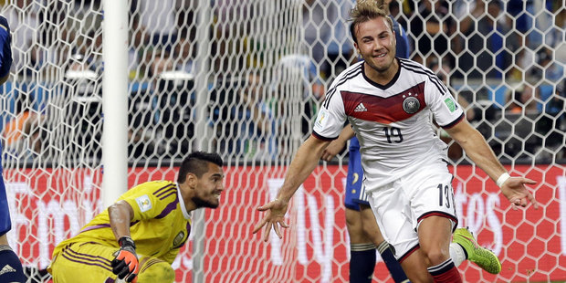 Germany's Mario Goetze celebrates after scoring the winning goal during the World Cup final soccer match between Germany and Argentina in Rio de Janeiro. Photo / AP
