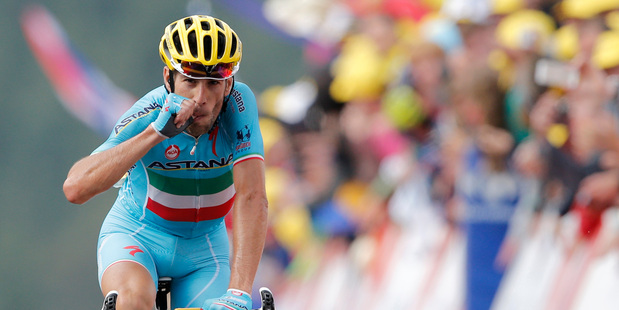Italy's Vincenzo Nibali crosses the finish line to win the tenth stage of the Tour de France. Photo / AP