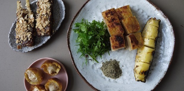 Popular dishes from Pinbone include the "cheesy, smoky, potato thing", lamb ribs with 5-spice & almond, and Pork Belly & grilled pineapple with liquorice root & kombu dipping salt. Picture / Supplied