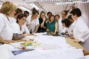 Seamstresses at the Dior atelier inspect sketches of Raf Simons' first couture collection for the house - showcased in the documentary Dior and I. Picture / Supplied