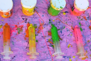 Dayton Preston hopes to raise enough from his paintings made with medical syringes for a trip to Universal Studios.