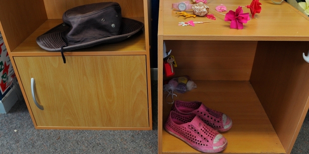 Bradley Livingstone's hat and his sister Ellen's shoes in a poignant memorial at St Leonards School. Photo / Otago Daily Times