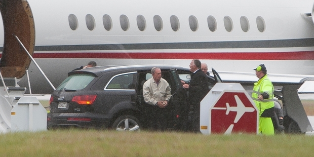 Michael Bloomberg heads for his private jet after less than 24 hours in Queenstown. Photo / James Allen