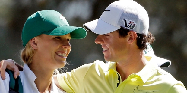 Caroline Wozniacki says confirming her engagement with Rory McIlroy means they can both focus on their careers. Photo / AP