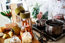 Chef Sean Walsh prepares a clam linguini dish inside the dining area of Fish restaurant. Photo / Babiche Martens.