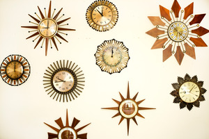 Teresa's starburst clock collection. Photo / Babiche Martens