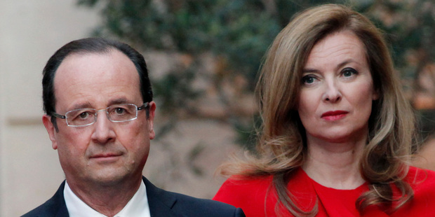 French President Francois Hollande, left, and his companion Valerie Trierweiler arrive for a state dinner at the Elysee Palace in Paris. Photo / AP
