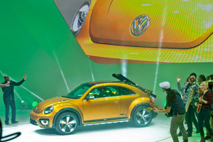 The Volkswagen Beetle Dune concept car is unveiled with performers. Photo / AP