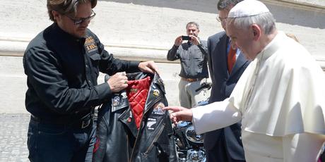 Pope Francis receives a leather jacket from Harley Davidson Motor Company senior vice-president Mark Hans-Richer. Photo / Supplied