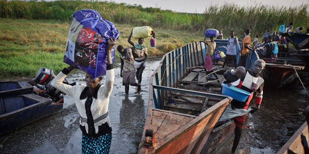 Displaced people flee heavy violence in South Sudan. Photo / AP