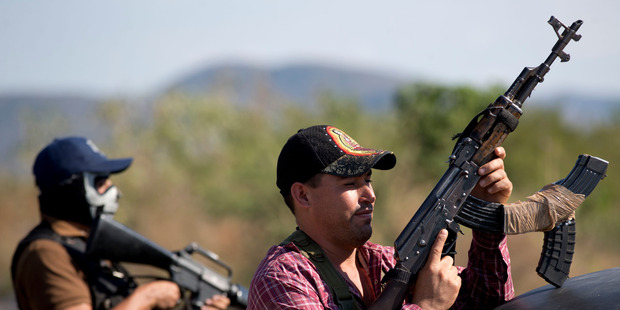 Armed men belonging to the Self-Defense Council of Michoacan. Photo / AP