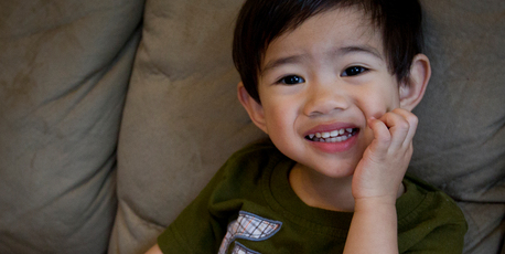 Two-year-old Daniel uses an iPad for the education apps downloaded by Dad. Photo / Sarah Ivey