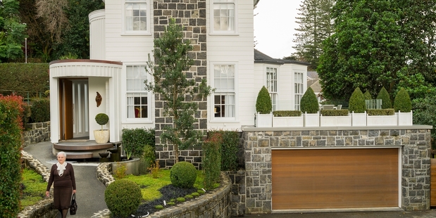 This renovated 1940s Epsom home has electronic controls, a cedar trapezoidal feature wall, and the gardens have been designed to develop into private oasis. Photo / Ted Baghurst