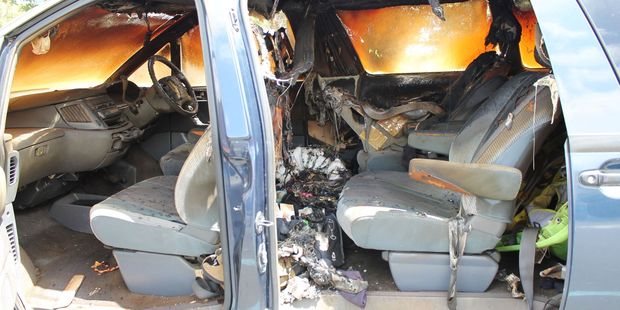 The interior of the car was gutted by the flames. Photo / Manawatu Guardian