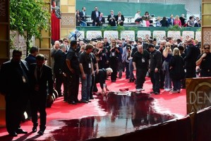 Uh-oh - who left that there? Staff clean up water on the red carpet of the Golden Globe awards in Beverly Hills. Photo / AFP