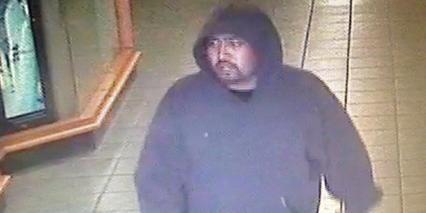 One of two men who robbed a Papakura bar was caught on camera.