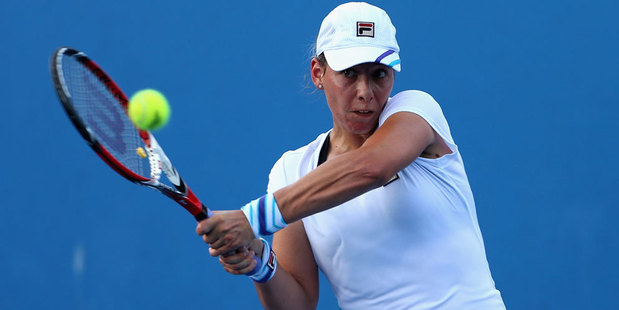 Marina Erakovic plays a backhand in her first round match against Sorana Cirstea of Romania during day two of the 2014 Australian Open. Photo / Getty Images