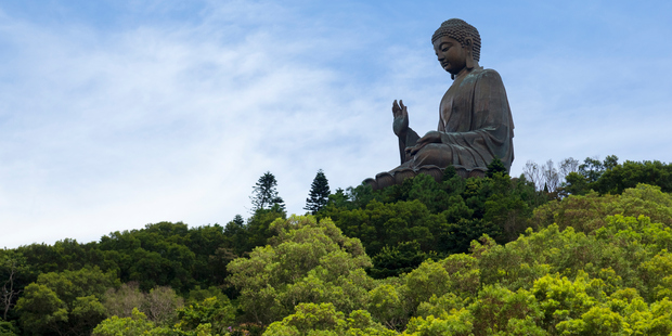 Head to Lantau Island, a 50-minute boat ride from downtown Hong Kong, and go hiking in the hills presided over by the giant Tian Tan Buddha. Photo / Thinkstock