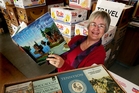 Jessie Bell sorting books. Photo / John Stone Jessie Bell sorting books. Photo / John Stone