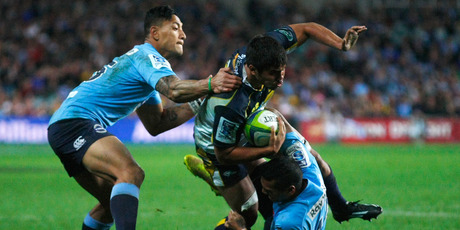 Jarrad Butler of the Brumbies is tackled during the Super Rugby semi final against the Waratahs. Photo / Getty Images