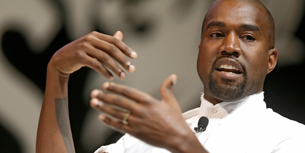 Kanye West compares Kim Kardashian to a dinosaur in the latest edition of GQ. Photo/AP