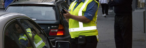 Parking warden on patrol on High Street in Auckland's CBD. Photo / Steven McNicholl