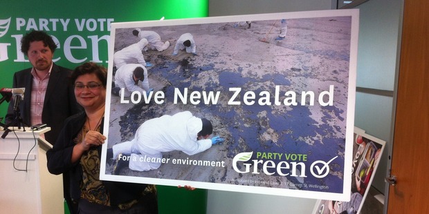 One of the billboards featuring an Rena oil spill scene.