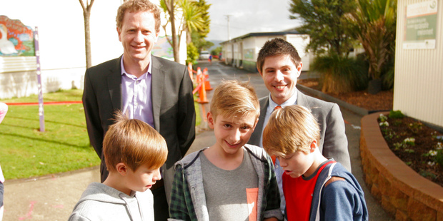 Green MPs Dr Russel Norman and Gareth Hughes with pupils of Laingholm School at the launch of the Green Party's Solar In Schools policy. Photo: James Russell